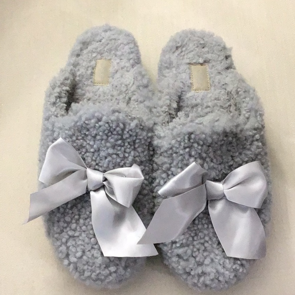 Super cute UGG slip on Size 10. Gray. Thicker sole. Perfect condition